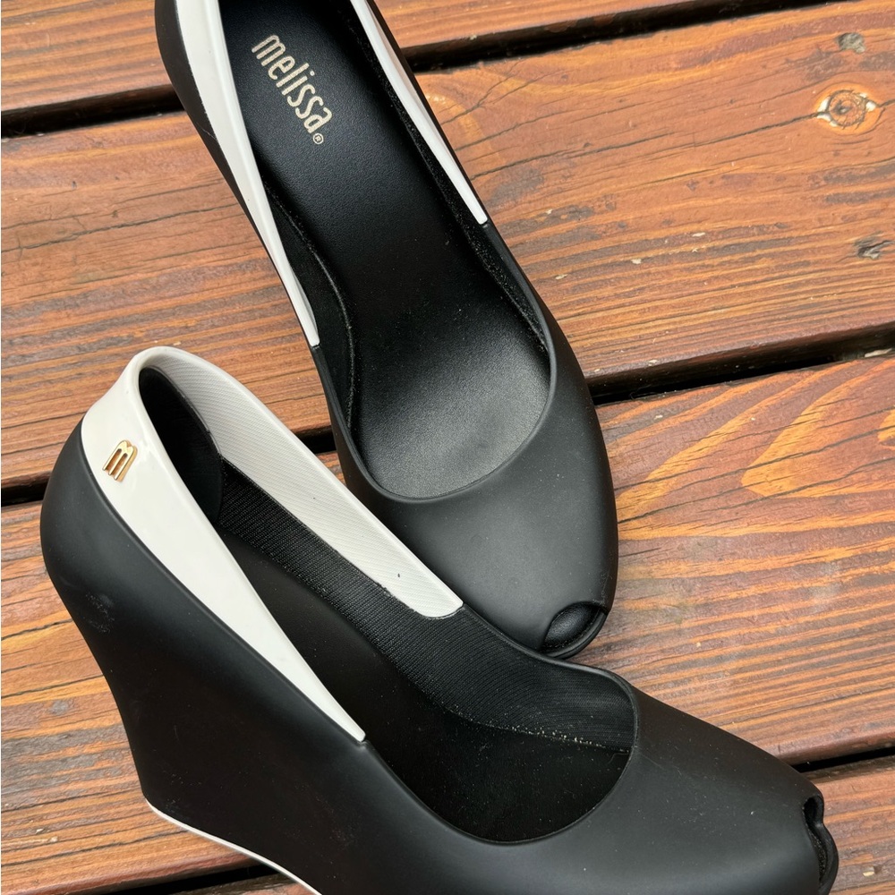 “ Melissa”  shoes. A detailed wedge slip on. with a white edge design. 7 1/2